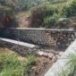 Foto: proyek pemasangan batu pada anak sungai di Desa Cangkreng. 